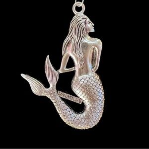 Laghcat Mermaid necklace, silver tone metal, mermaid is 2 1/4 “ infinitely chain